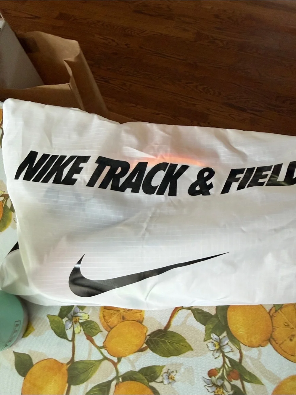 Nike men’s 10.5 track White Running Shoes with Orange and Neon Green Accents